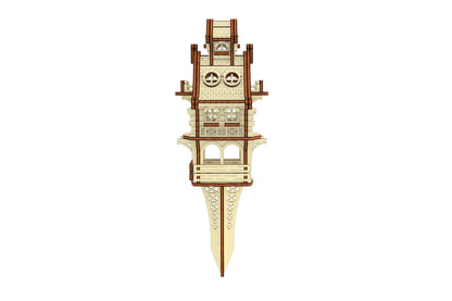 Straight front view of a tabletop laser cut plywood easter bunny house puzzle highlighting lovely carrot door engravings.