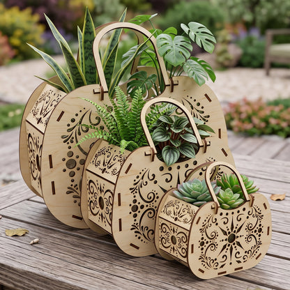 Three laser cut plywood flower baskets in different sizes filled with green plants and succulents on a wooden garden table.