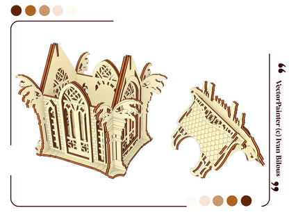 An assembled gothic house box base with a detached roof piece in laser cut plywood.