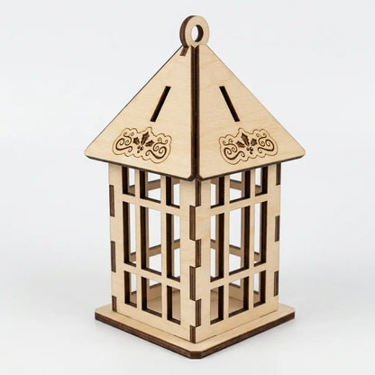 Freestanding laser cut plywood holiday lantern ornament featuring window grille panels isolated on white.