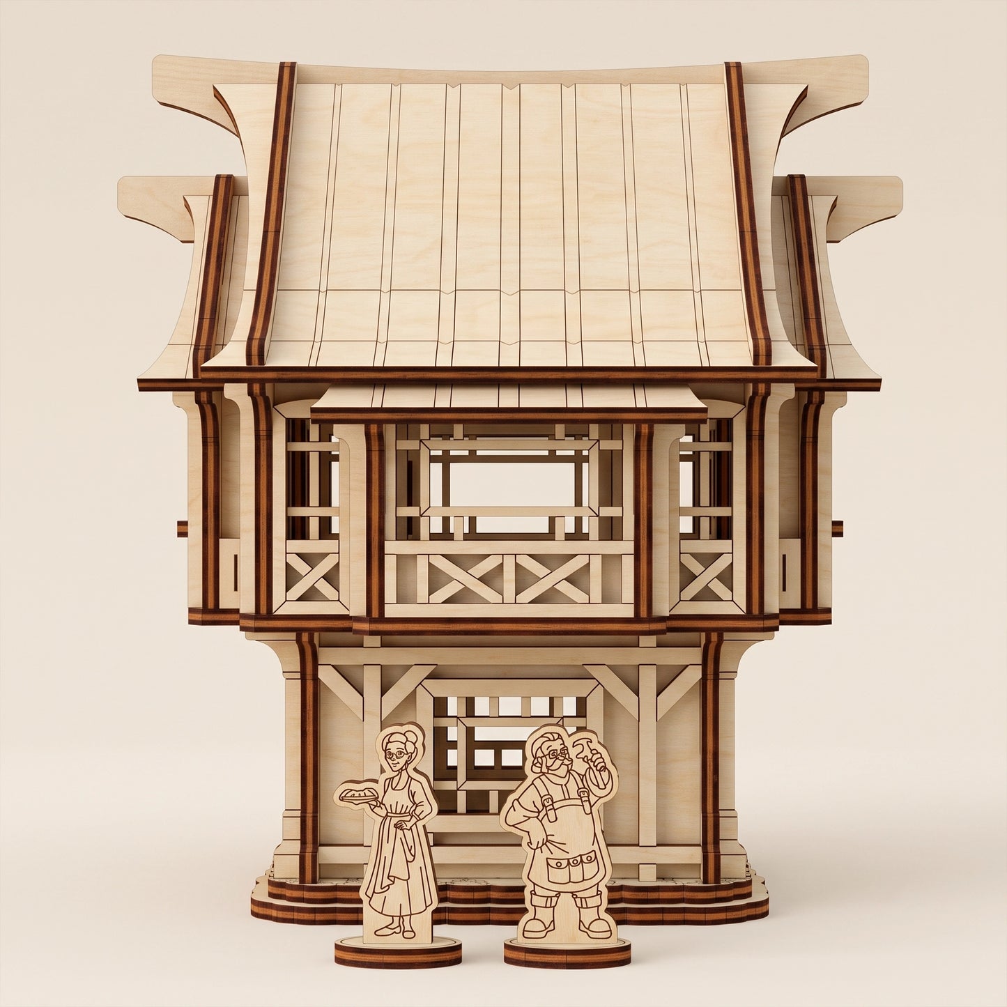Laser cut plywood medieval village house model with two wooden character figures.