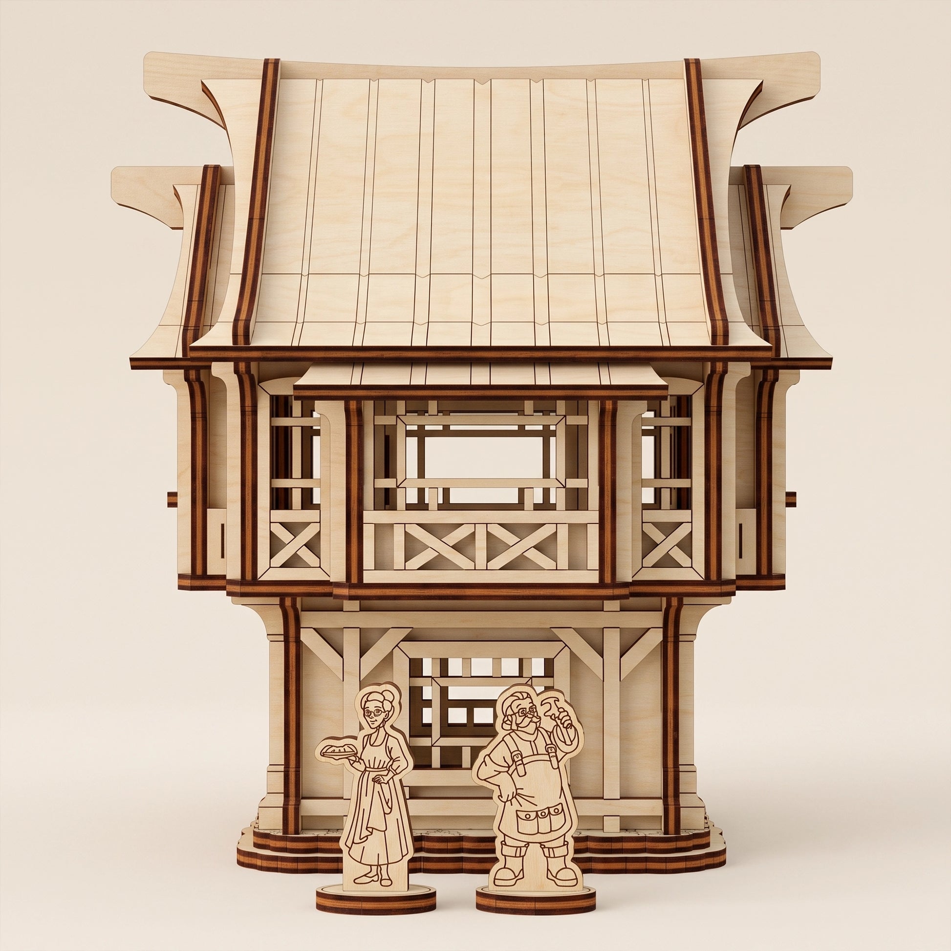 Laser cut plywood medieval village house model with two wooden character figures.