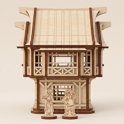 Laser cut plywood medieval village house model with two wooden character figures.