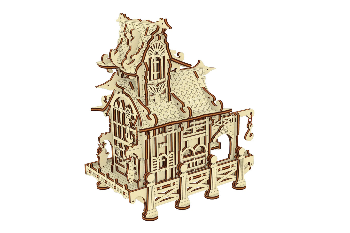 Rear angle view of a laser cut plywood sailor house with hanging wooden fish decor, a steering wheel, and anchor engraving.