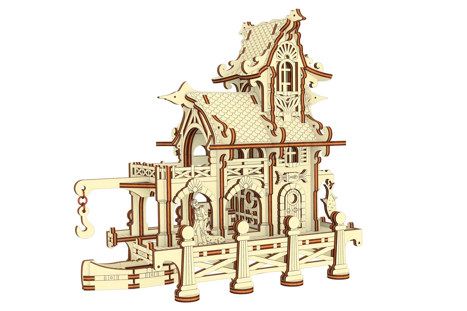 Laser cut plywood sailor house with a tiny fisherman figure, engraved anchor details, and detailed arched windows.