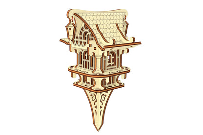 Side angle of a charming fairy garden stake house, crafted from durable laser cut plywood with ornate roof detailing.