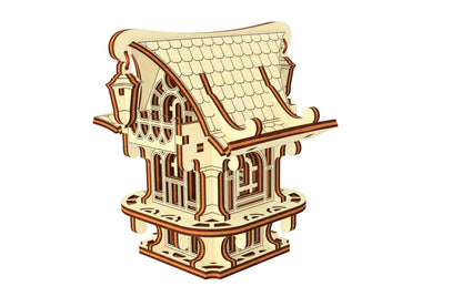 Three-quarter view of a completed laser cut plywood fairy house model, perfect for whimsical home or garden displays.