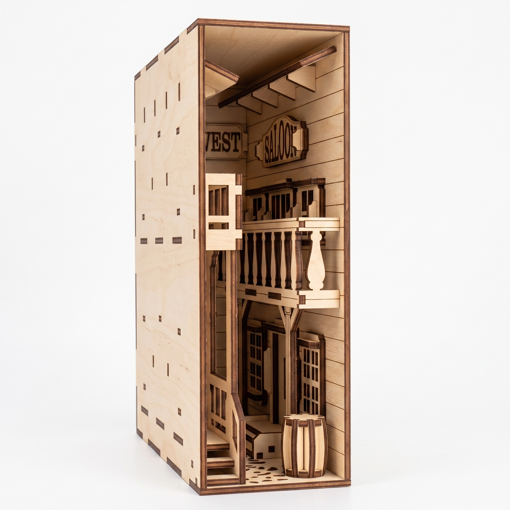 Three-quarter view of a laser-cut birch plywood Wild West saloon book nook featuring a balcony, barrels, and natural wood.