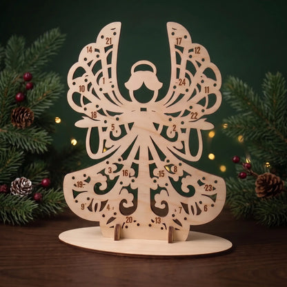 Empty laser cut plywood angel advent calendar stand with numbered lollipop holes framed by pine branches.