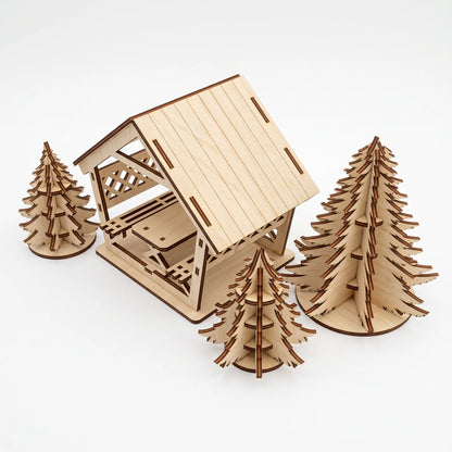 Top angle view of laser cut plywood gazebo kit with slatted roof and three 3D Christmas trees on seamless white background.