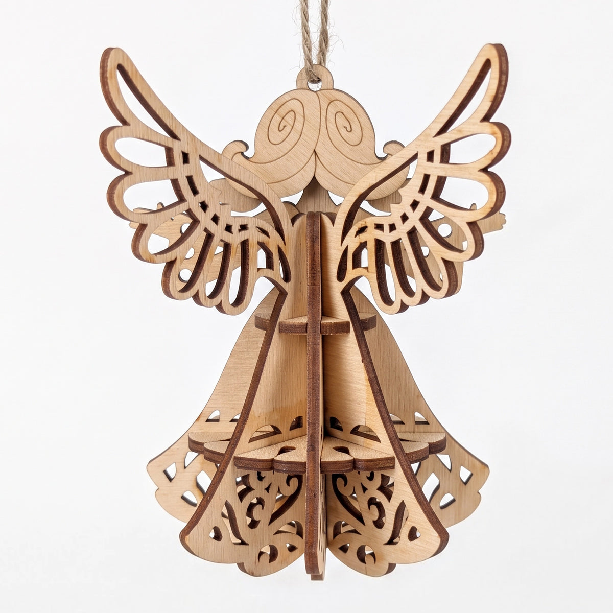Back view of 3D laser cut plywood angel ornament showing intricate carved wings and slotted skirt on plain white background.