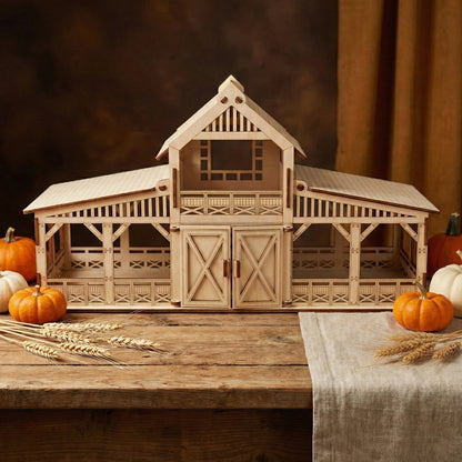 Symmetrical front view of the finished laser cut plywood barn model with main doors closed. Showcases the clean geometric cutouts, loft windows, and the natural light wood grain finish.
