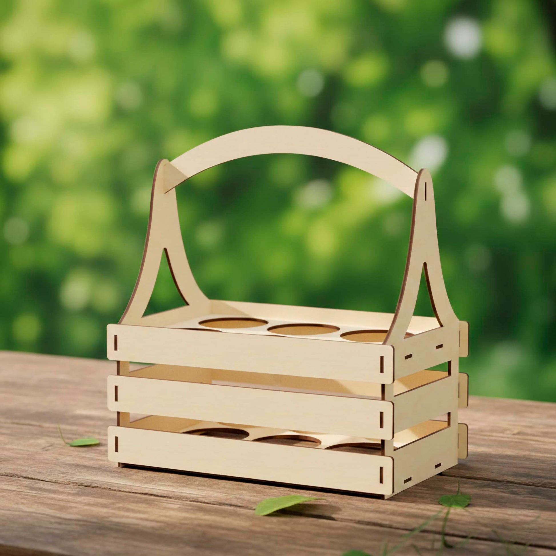Empty laser cut plywood beer carrier with a minimalist slatted design. Shows precision-cut circular dividers for six bottles and a smooth arched handle. The wood features clean, dark laser-processed edges.