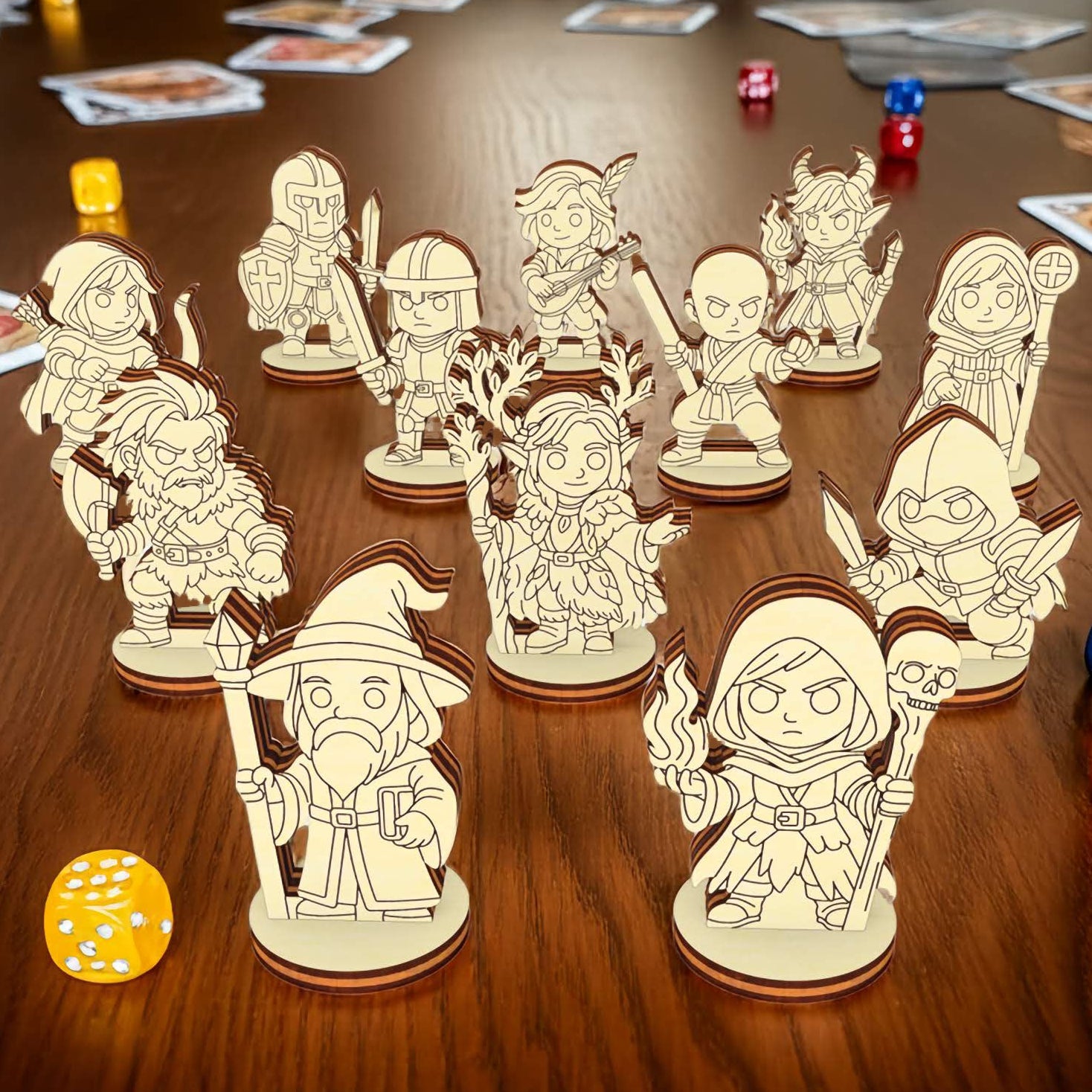 Complete set of wooden fantasy RPG miniatures arranged on tabletop, laser cut characters with dice and cards for board games