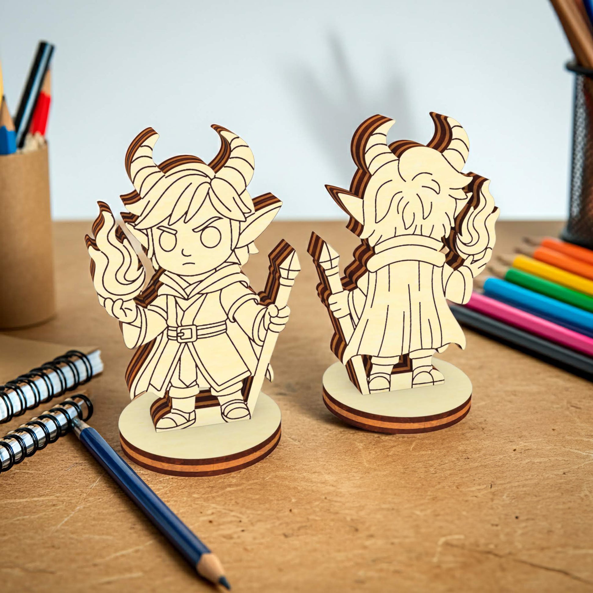 Laser cut demon fantasy RPG miniature shown front and back, wooden tabletop character with horns and magic staff