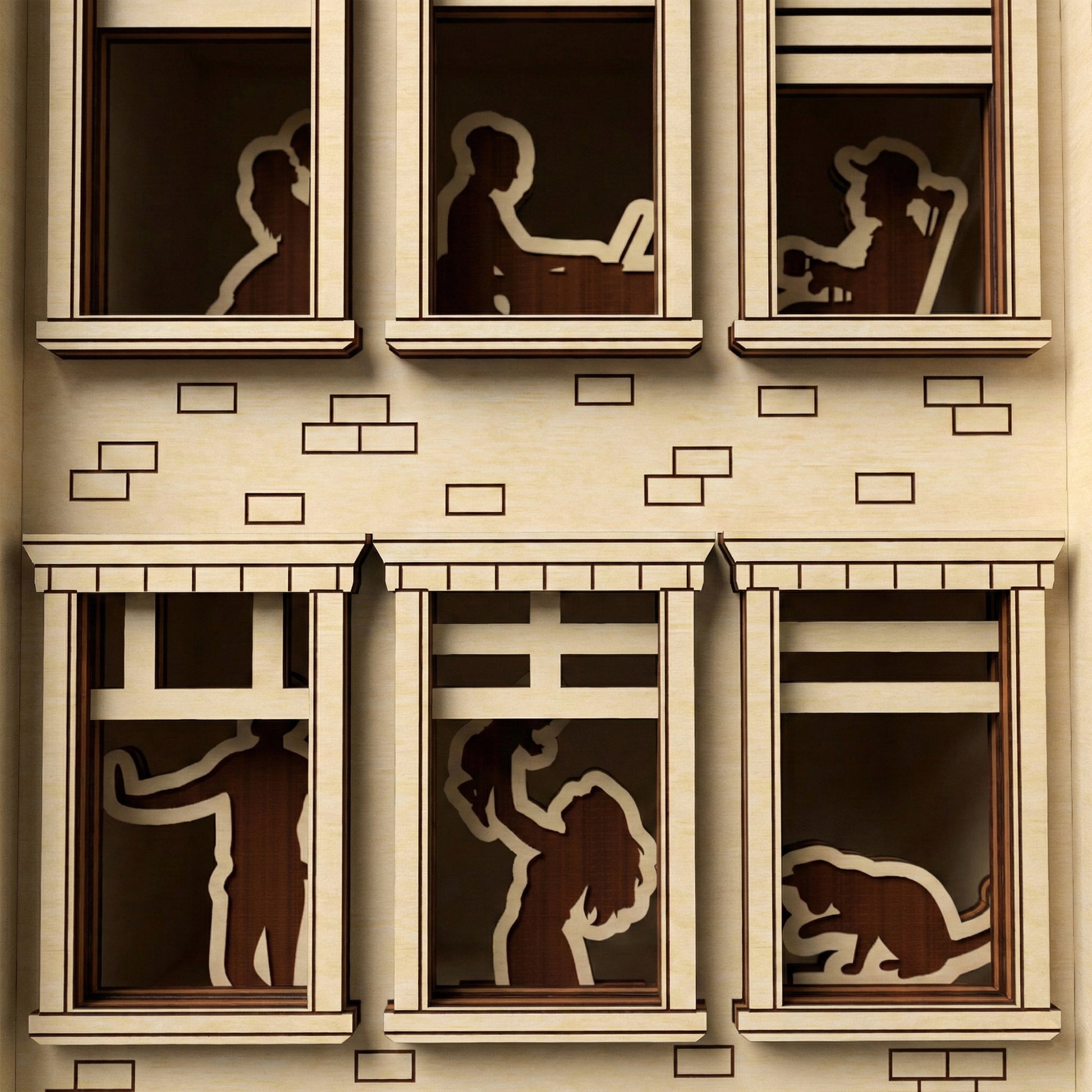 Macro view of a laser cut wooden Book Nook Apartment House highlighting intricate window silhouettes, with a close-up architectural facade background.
