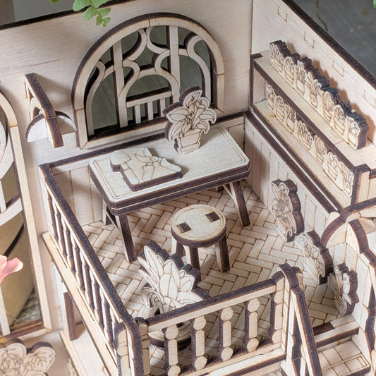 Wooden book nook dollhouse furniture set with chairs, table, and stool on a tiled floor.