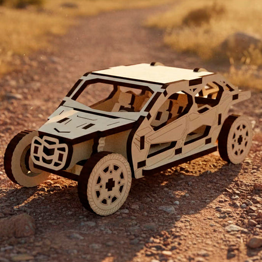 Laser cut wooden  plywood off-road buggy model featuring a detailed rear chassis and spare tire mounts. The 3D wooden puzzle is placed on a dirt path during golden hour with dry grass and hills in the background.