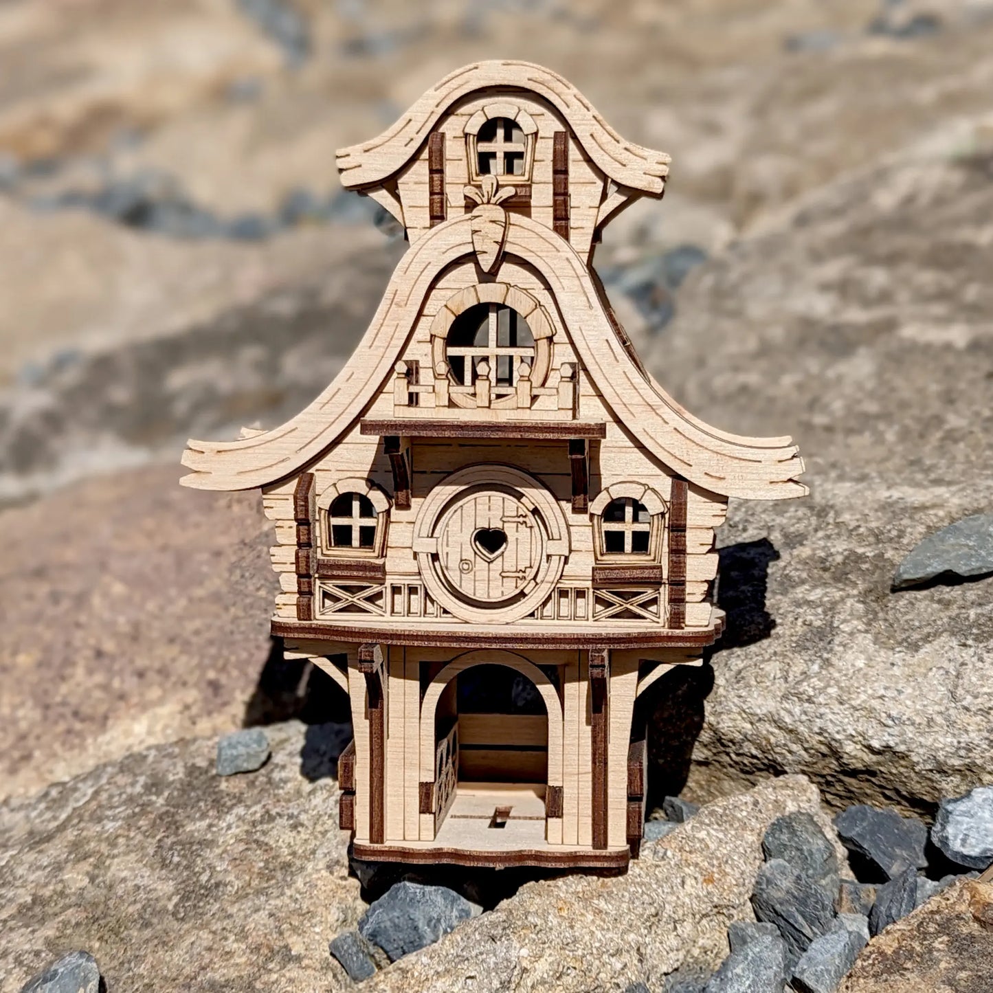 Laser cut plywood easter bunny puzzle home showing detailed rear window cutouts.