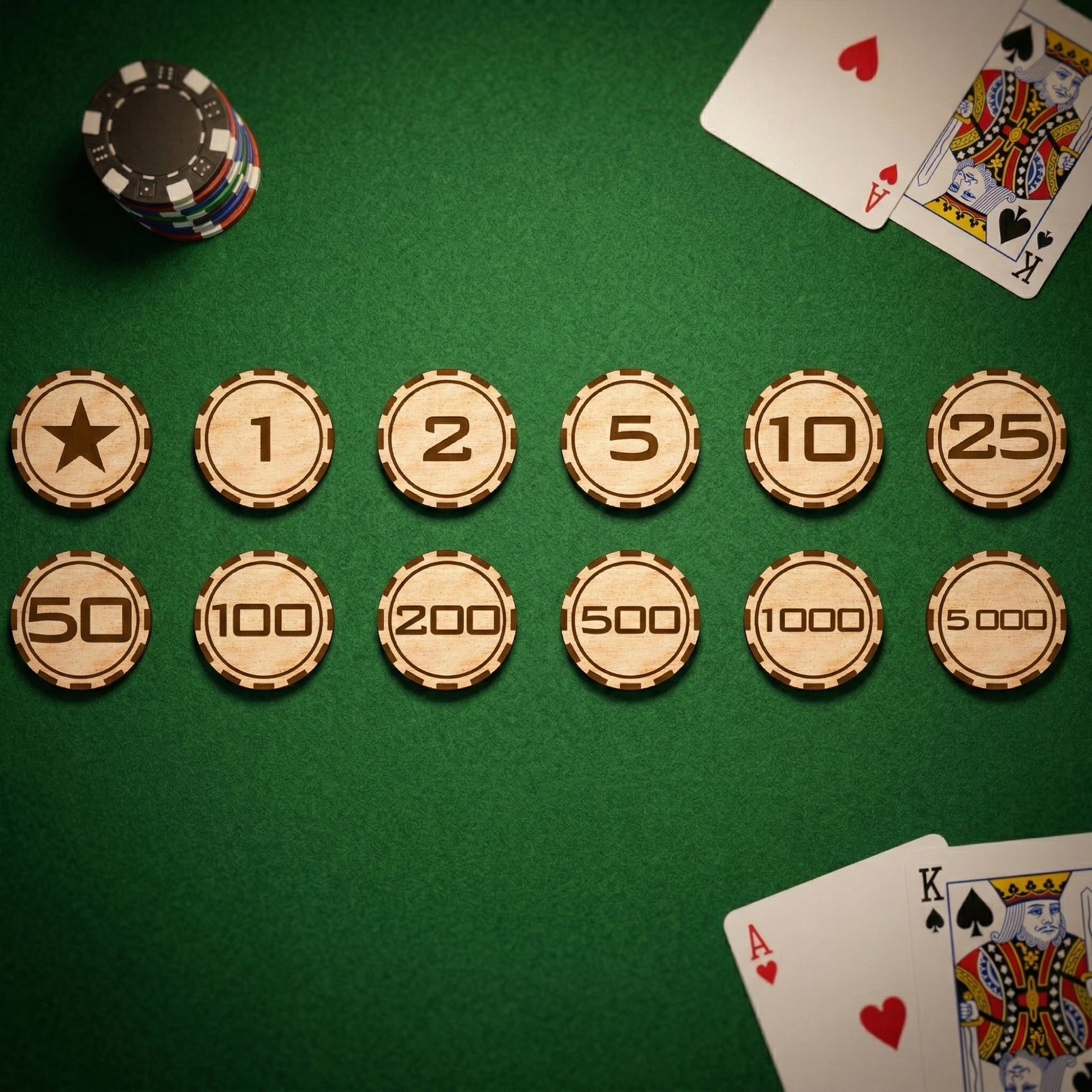 Twelve unique laser-cut wooden poker chips displayed in two neat rows on green felt. Denominations include 1, 2, 5, 10, 25, 50, 100, 200, 500, 1000, 5000, and a star chip. Highlights the natural plywood finish and precise engraving.