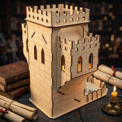 Profile view of a laser cut plywood castle dice tower showing the height and etched brick texture. The gothic design features tall arched windows and crenelated towers. Posed in a dark study with old leather books and rolled paper scrolls.