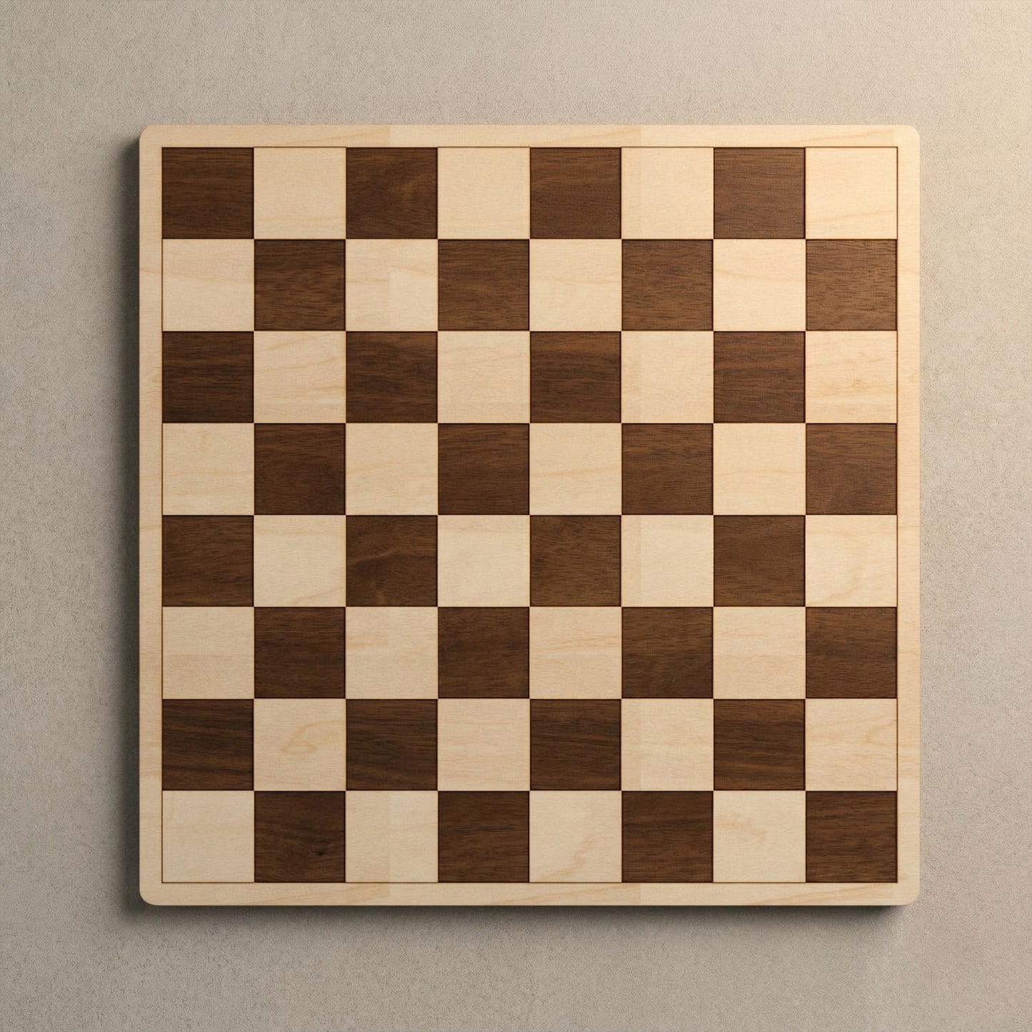 Top-down view of a square laser cut plywood chess board. The board features high-contrast light and dark wood squares with rounded corners. The natural grain is visible throughout the smooth surface, creating a modern, minimalist look.