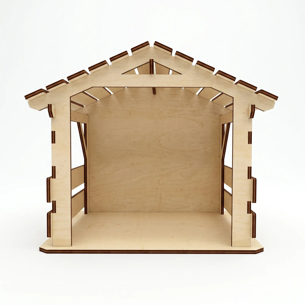 Front view of empty assembled laser cut plywood nativity stable barn with slotted wood roof on white background.
