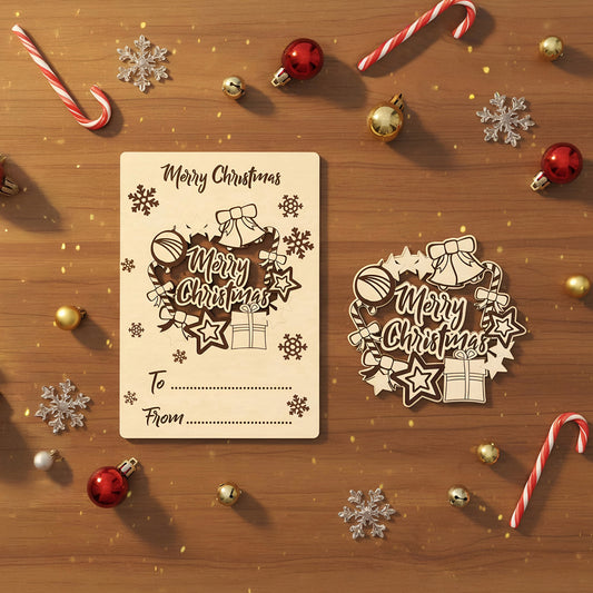 Delicate laser cut wooden Christmas card and tag set displaying elegant "Merry Christmas" lettering surrounded by festive bells, candy canes, presents and snowflakes, presented on a cozy wooden surface.