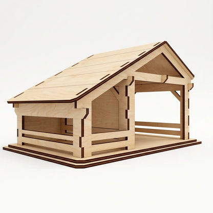Perspective view of an empty laser cut plywood nativity barn model with sloped roof on white backdrop.