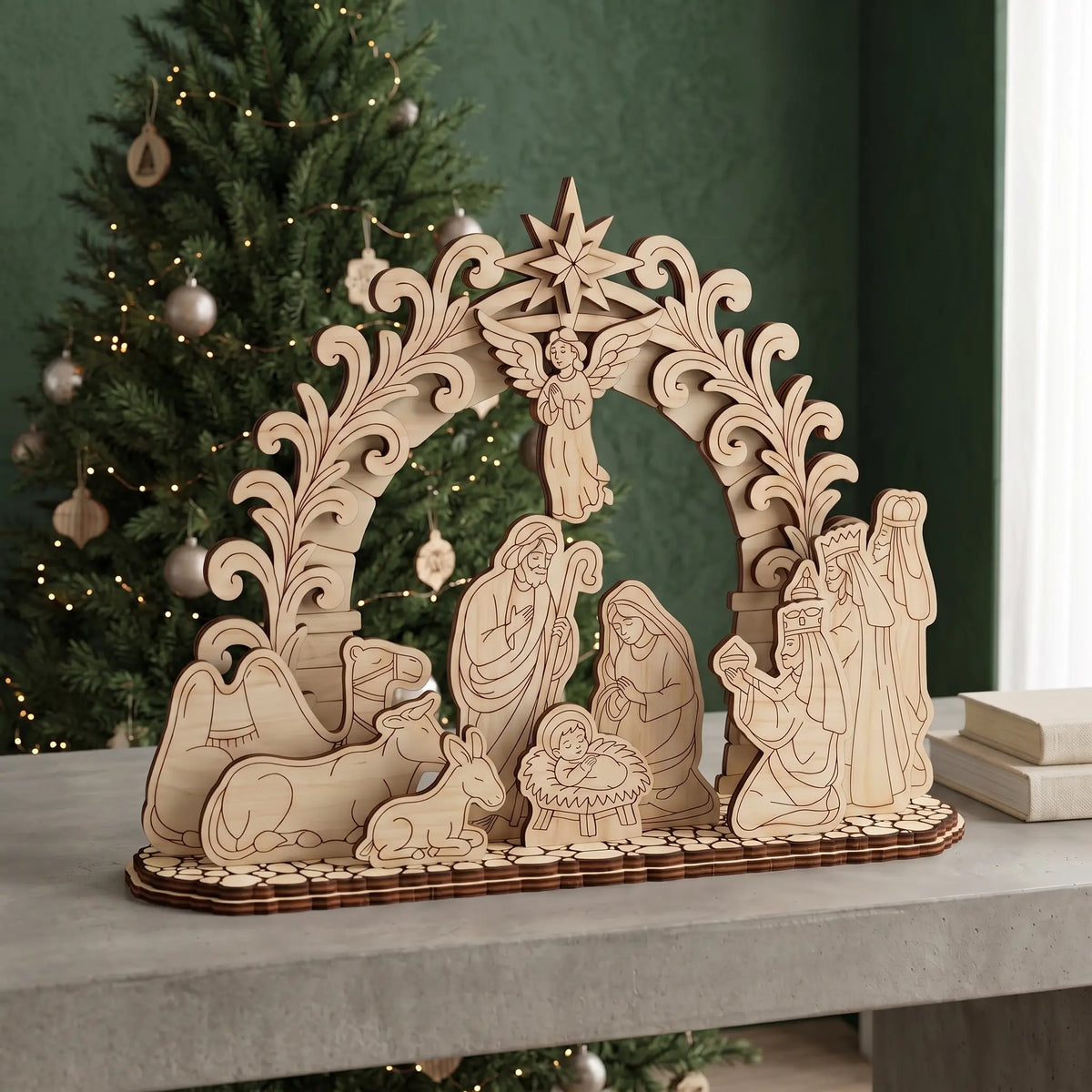 Laser cut plywood nativity scene schwibbogen on a table with Christmas tree and festive bokeh background.