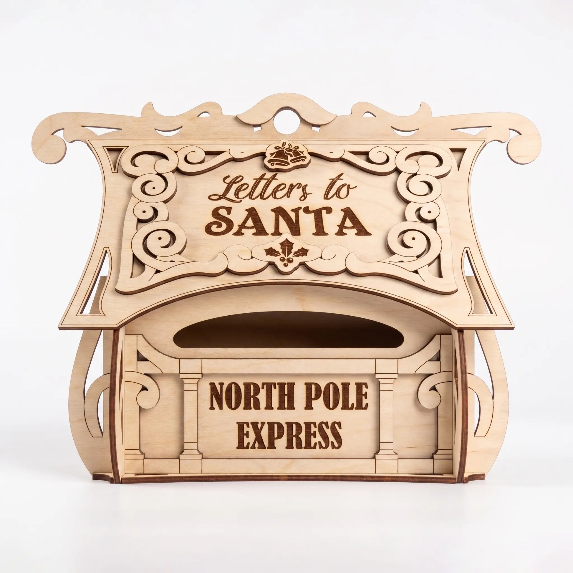 Straight front view of a laser cut plywood Letters to Santa mailbox, North Pole Express slot, on white background.