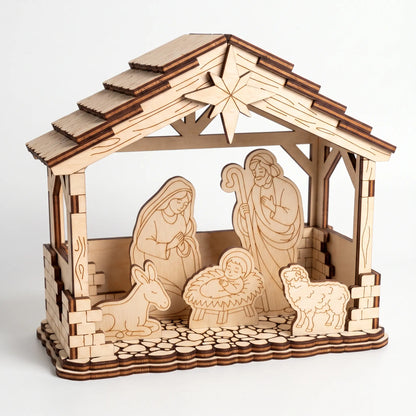 Front three-quarter view of laser cut plywood Nativity stable diorama with Holy Family and star on plain white background.
