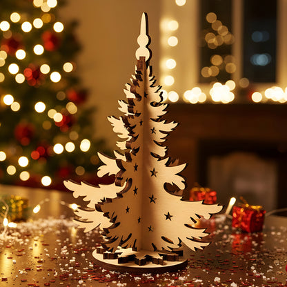 Laser cut wooden Christmas tree decor with intricate layered branches and star cut-outs on a round base, displayed against a warm blurred Christmas tree lights background.