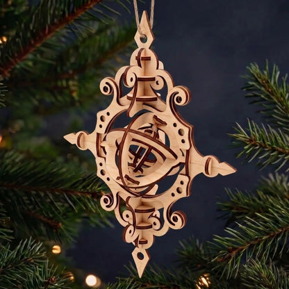 Rotating kinetic laser cut plywood Christmas pendant bauble suspended on jute twine against dark pine needles.