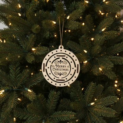 Interactive laser cut Christmas tree toy Xmas featuring a rotating holly wreath design on a round hanging ornament engraved with festive wishes, set against a softly lit Christmas tree background.