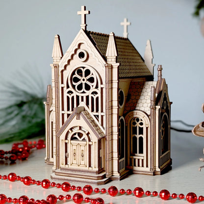 Detailed front-perspective product view of a gothic cathedral building model styled with beads and laser cut plywood.