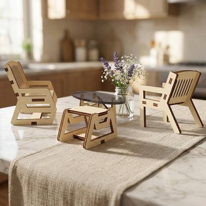 Side view of miniature laser cut plywood chairs and bench showing interlocking tab construction. The natural wood grain and dark edges highlight the modern DIY aesthetic. Set on a linen table runner with a blurry kitchen background.