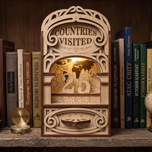 Finished Countries Visited laser cut file project displayed on a bookshelf with layered wood details, world map, and travel-themed design.