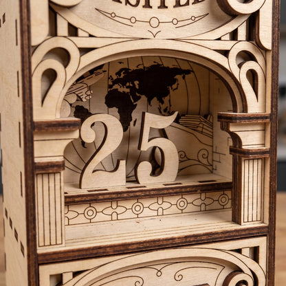 Close-up of a laser cut Countries Visited book nook with layered wooden travel design, world map background, and 25 country counter.