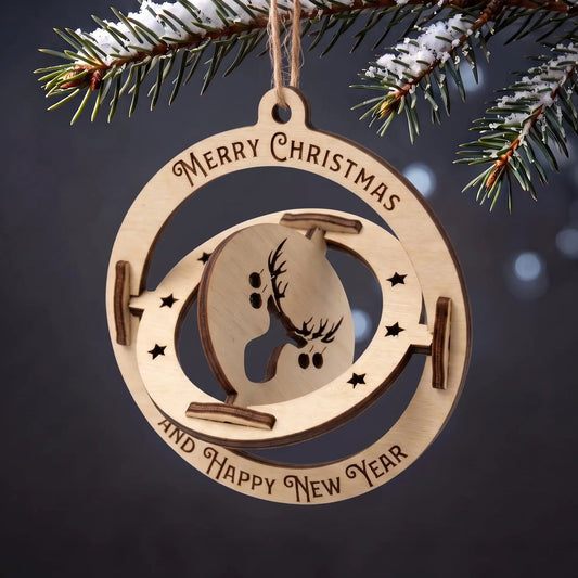Kinetic laser cut plywood 3D sphere ornament with spinning reindeer center hanging from snowy evergreen branch