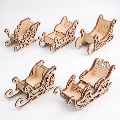 Bundle of five different assembled laser cut plywood Santa sleigh models arranged on clean white background.