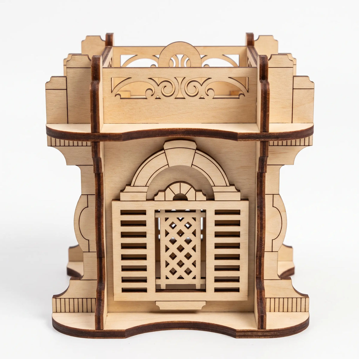 Front view of laser cut plywood architectural lantern featuring shuttered arched windows on a seamless white background.