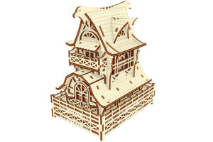 Laser cut wooden model of a Garden Gnome House, featuring a veranda, curved roof, and two floors.