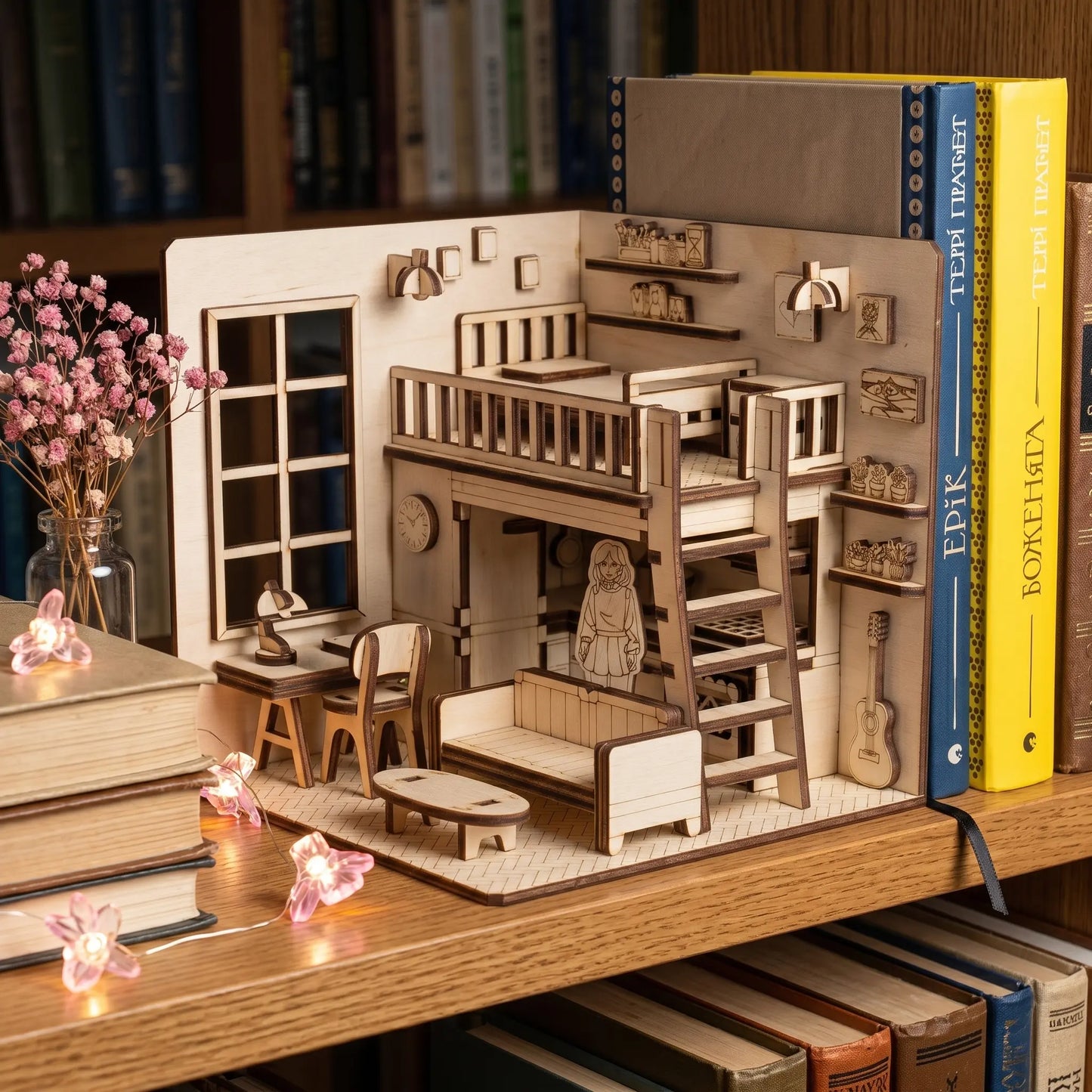 A wooden dollhouse with a bunk bed, bookshelf, and other furniture is displayed on a wooden shelf