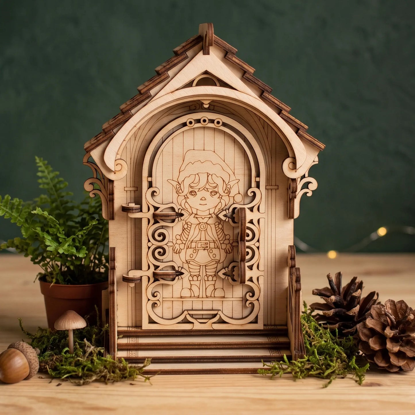 A miniature wooden fairy door miniature with an engraved elf character