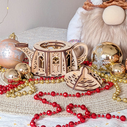 Laser cut plywood kettle house box shown open with removable lid, displayed among Christmas ornaments and festive beads