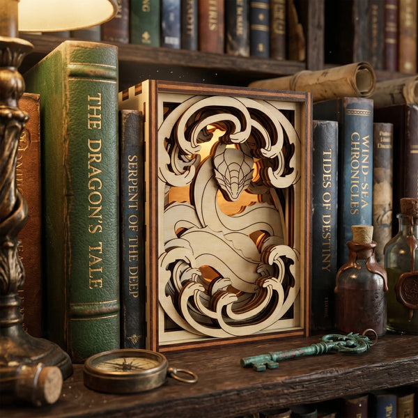 Decorative wooden laser cut box with dragon design on a shelf with books and bottles