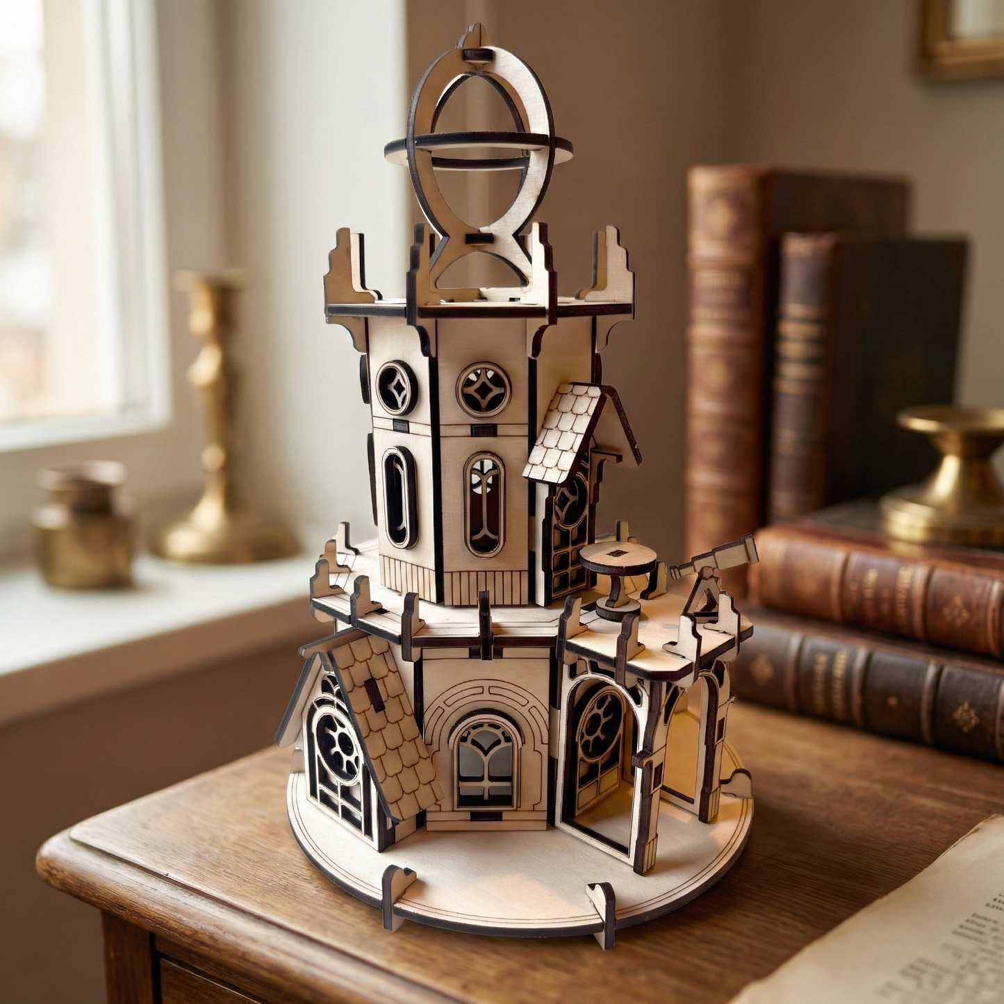 Wooden laser cut model of a clock tower on a wooden table with books in the background