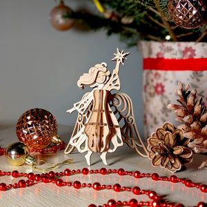 Intricately designed Christmas Angel ornament holding a star for festive decorations