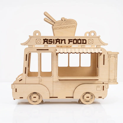 Wooden model of an Asian food truck on a white background